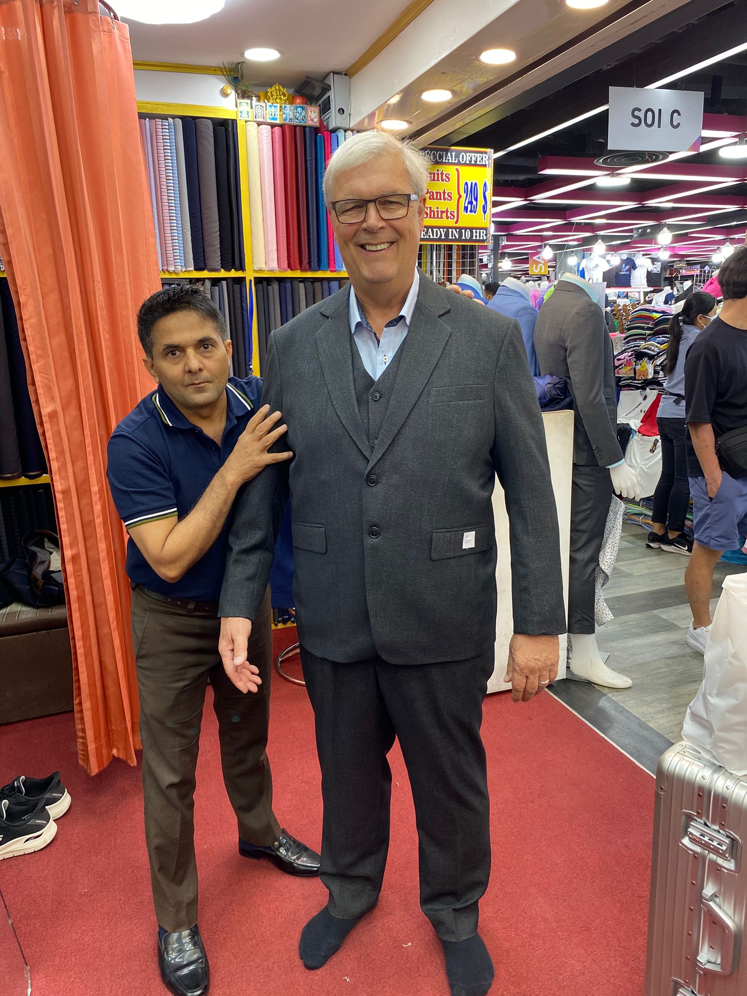 Happy client in custom tailored suit at King Fashion Uni Bangkok